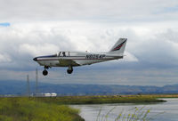 N6054P @ KPAO - 1959 Piper PA-24 Comanche over the wetlands on final to Palo Alto, CA - nice lighting! - by Steve Nation