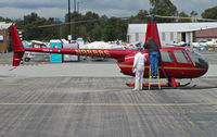 N9888S @ KPAO - Sirrius Aviation 2007 Robbie R44 receiving TLC at Palo Alto, CA - by Steve Nation