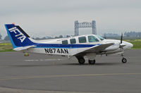 N874AN @ KAPC - IFTA/International Flight Training Academy (ANA Japan Airlines) 1993 Beech 58 in from KBFL (Meadows Field/Bakersfield, CA) with Napa River RR bridge in background - by Steve Nation