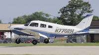 N7702H @ KOSH - EAA AIRVENTURE 2010 - by Todd Royer