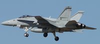 164246 @ ONT - Part of a four ship formation flight on final to runway 26R after a formation flyover for Fontana races, from Squadron VFA-94 - by Helicopterfriend