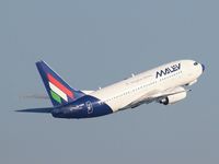 HA-LOA @ AMS - Take off of runway18L. - by Willem Goebel