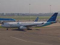 PK-GPH @ AMS - Taxi to the runway 18L for take off. - by Willem Goebel