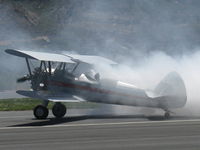 N65124 @ SZP - 1943 Boeing Stearman A75N1 'Spirit of OPEC', P&W R-985 Wasp Jr. (by Jacobs) 450 Hp upgrade, square wingtips, runway smoke act - by Doug Robertson