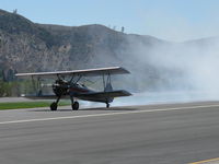 N65124 @ SZP - 1943 Boeing Stearman A75N1 'Spirit of OPEC', P&W R-985 Wasp Jr. (by Jacobs) 450 Hp upgrade, square wingtips, runway smoke act - by Doug Robertson