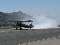 N65124 @ SZP - 1943 Boeing Stearman A75N1 'Spirit of OPEC', P&W R-985 Wasp Jr. (by Jacobs) 450 Hp upgrade, square wingtips, runway smoke act - by Doug Robertson