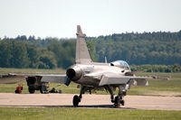 39172 @ ESOW - JAS 39A Gripen fighter parked at Västerås Hässlö airport, Sweden.