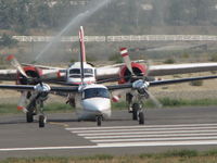 UNKNOWN @ CYKA - Bird Dog and a FireCat waiting their turn.