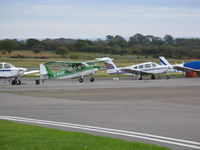G-BUGE @ EGFH - Through the fence. Visiting Citabria on the apron. - by Roger Winser