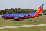 N407WN @ ORF - Southwest Airlines N407WN (FLT SWA2388) taxiing to RWY 23 via Taxiway Charlie for departure to Tampa Int'l (KTPA).