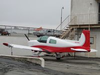 N5705L @ CCB - Tied down and parked - by Helicopterfriend