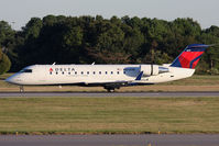 N8659B @ ORF - Delta Connection (Pinnacle Airlines) N8659B rolling out on RWY 5 after arrival from John F Kennedy Int'l (KJFK) as Flight FLG4357. Seagulls were infiltrating the airport, sometimes Alfred Hitchcock-like.