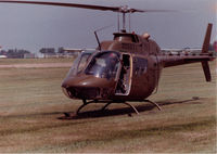 71-20527 - OH-58A that flew with Hq & Hq Company, 372nd Engineer Group 9USAR) at Fort Des Moines, Iowa in the 1980s.  I am at the controls with the red stripes on the visor of my flight helmet.  Was reregistered as N1045C in NOV of 2002.
