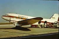 N47FJ @ CYWG - CF- WCM Winnipeg, 1970 At that time SN 9053 had only a small airstair door and not the cargo door shown when it was N47FJ. - by Al Nelson