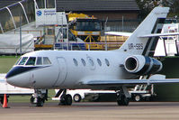 UR-SBS @ EGGW - Ukraine registered Dassault Falcon 20, c/n: 141 at Luton - by Terry Fletcher