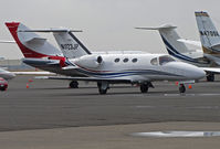 N923JP @ KAPC - Raspberry Consulting (Monterey Park, CA) 2008 Cessna 510 taxis across crowded bizjet ramp for flight to KOXR (Oxnard, CA) - by Steve Nation