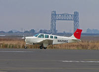 N8298G @ KAPC - 1992 Beech A36 taxis past Napa River RR Bridge for check flight with JAL/Japan Airlines titles painted over (JAL closed their IASCO-run US training program in October 2010) - by Steve Nation