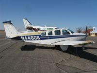 N4460S @ KAXN - Beech A36 Bonanza on the line. - by Kreg Anderson