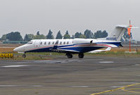 N605SE @ KAPC - FlexJets 2006 Learjet 45 leaving Bizjet ramp for flight to KLAS as LKJ400 - by Steve Nation