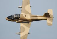 G-UVNR @ EGFH - Flyby over Runway 22 by resident Strikemaster (Viper 2). - by Roger Winser