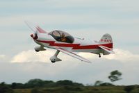 G-BKCX @ EGFH - Flyby over Runway 22 - by Roger Winser