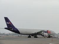 N670FE @ ONT - Parked east of Fed Ex hanger - by Helicopterfriend