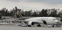 N303UP @ ONT - Parked in UPS parking area southeast portion of Airport and being loaded - by Helicopterfriend