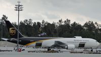 N337UP @ ONT - Parked in UPS parking area southeast portion of Airport and being loaded - by Helicopterfriend