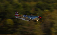 N251MX @ HKY - The Collings Foundation TP-51C on a low pass.