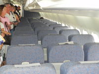 VH-NXH @ BME - Cabin - by Henk Geerlings