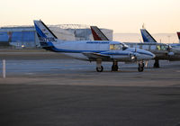 N6759L @ KOAK - Ameriflight 1970 PA-31-310 freighter on OAK North Ramp at sunset - by Steve Nation