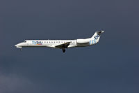 G-ERJA @ EGCC - Manchester, Against storm clouds.