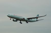 C-GHKW @ CYVR - Landing on a typical YVR dull,wet day