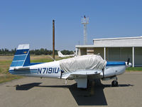 N7191U @ O52 - 1964 Mooney M20E with cover - by Steve Nation