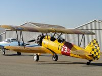 N53153 @ CCB - US Navy Stearman N2S-3 parked at Cable and checking engine - by Helicopterfriend