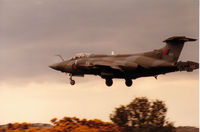 XW534 @ EGQS - Buccaneer S.2B of 12 Squadron crossing the boundary fence onto Runway 23 at RAF Lossiemouth in May 1989. - by Peter Nicholson