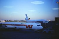 N2804W @ KMSP - Shown with an unidentified DC-10 Spaceship in the background.