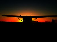 VH-TLM - VH-TLM sun rise Noccundra qld - by adrian