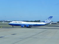 N197UA @ SYD - Departure to the US - by Henk Geerlings