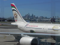 A6-EHF @ YSSY - Spcl logo: Abudhabi Grand Prix - by Henk Geerlings