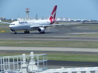 VH-EBH @ SYD - Just landed at SYD - by Henk Geerlings