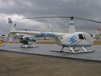 N7194U @ KSQL - 2001 Robbie R44 mostly uncovered @ San Carlos, CA - by Steve Nation