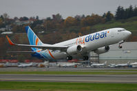 A6-FDK @ KBFI - FlyDubai 737-8KN, seen departing BFI on its delivery flight. - by Joe G. Walker