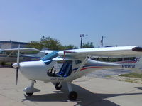 N107GX @ KIGQ - Remos N107GX at Lansing, IL airport - by W. R. Lang
