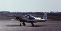 G-AROT @ EGFH - Carrying race #77. Poor but rare photograph of the resident Falco in the early 1970's. Date is a guess. - by Roger Winser