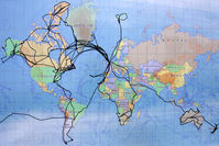 G-SEEK @ X5FB - A close-up of the map applied to Earthrounder Andy Hopper's Cessna T210N illustrating the many global flights this aircraft has undertaken. - by Malcolm Clarke