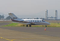 N101AR @ KAPC - A & R Aircraft LLC 2006 Raytheon 400A taxis past Napa River RR Bridge on way to departure RWY - by Steve Nation