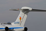 N269MJ @ KAPC - Thought this must belong to Jimmy Buffett but, no, the Parrot identifies Maui Jim Inc. (Peoria, IL!) 2007 Challenger BD-100-1A10 (parrot tail logo) at Napa, CA - by Steve Nation