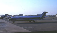 N8844E @ KMIA - Note the King's Inn in the background.