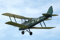 SE-FNA @ ESGP - Tiger Moth during an air display at Gothenburg Säve airport, Sweden - by Henk van Capelle